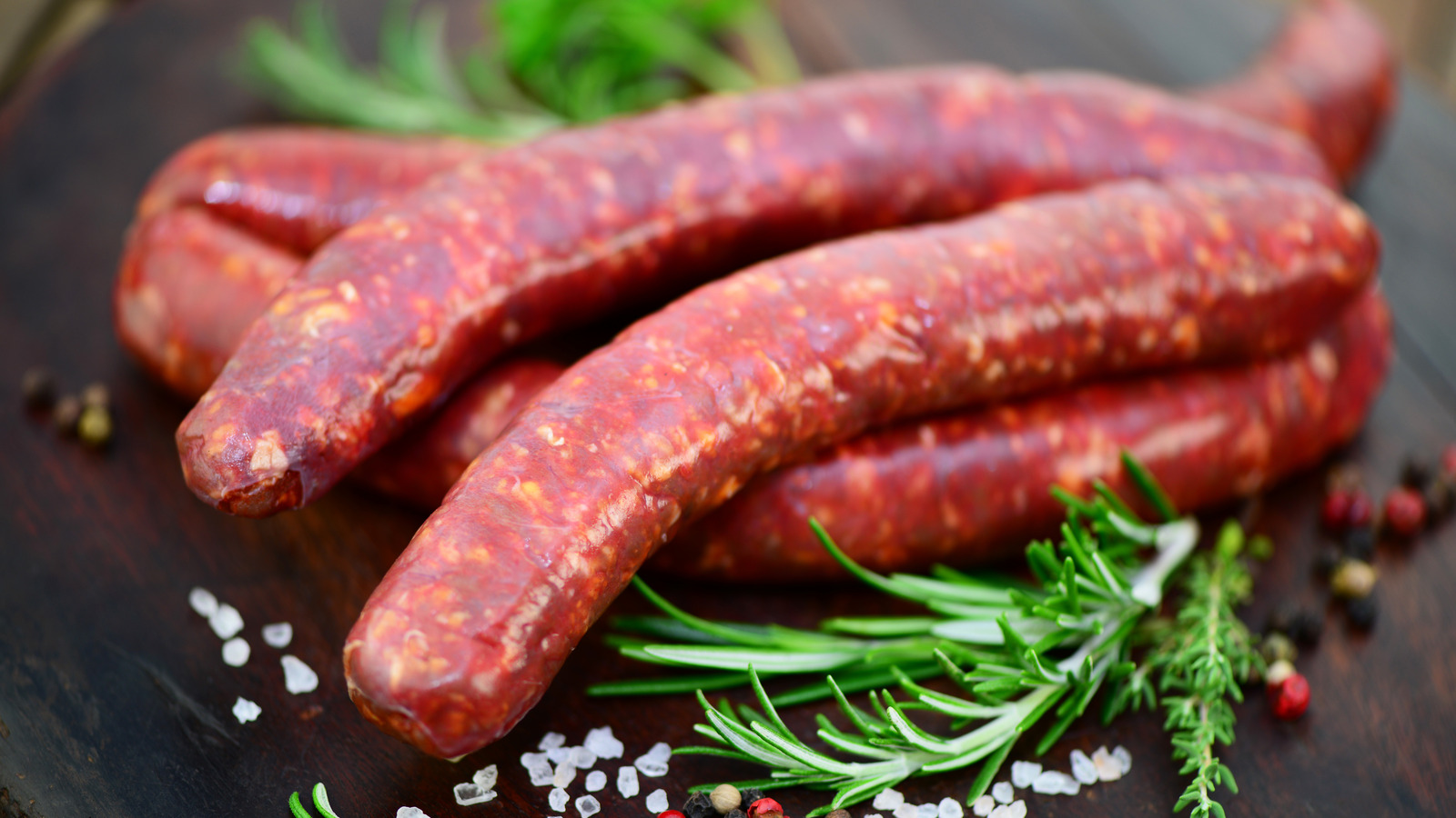 Sausages,,Raw,Merguez,With,Herbs,And,Spices,,Closeup.